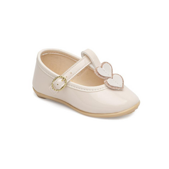 Cream baby Mary Jane shoe with buckle strap and two heart appliqués outlined in glitter.