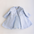 Light blue girls’ formal coat with textured fabric, lace trim at the waist, and sheer tulle dress peeking underneath, ideal for special occasions.
